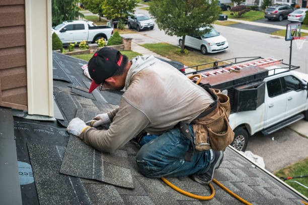 Professional Roofing technician working in Old Mystic, CT